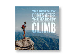 Модерна слика на платно со мотив The best view comes, небо, пејзаж, мотивациски цитат во бело-сино нијанси, охрабрувачка атмосфера, погоден за канцеларија – главна
